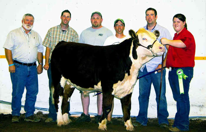 Photo of members of Local 80058 after purchasing a prize steer at the Cumberland County Exhibition